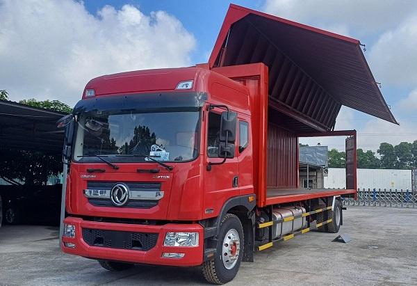 Xe tải thùng container cửa nâng hạ thủy lực dạng cánh dơi